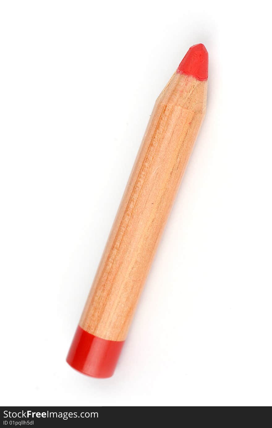 Red pencil on white background