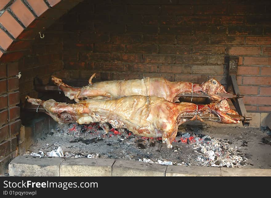 Two lamb on a spit