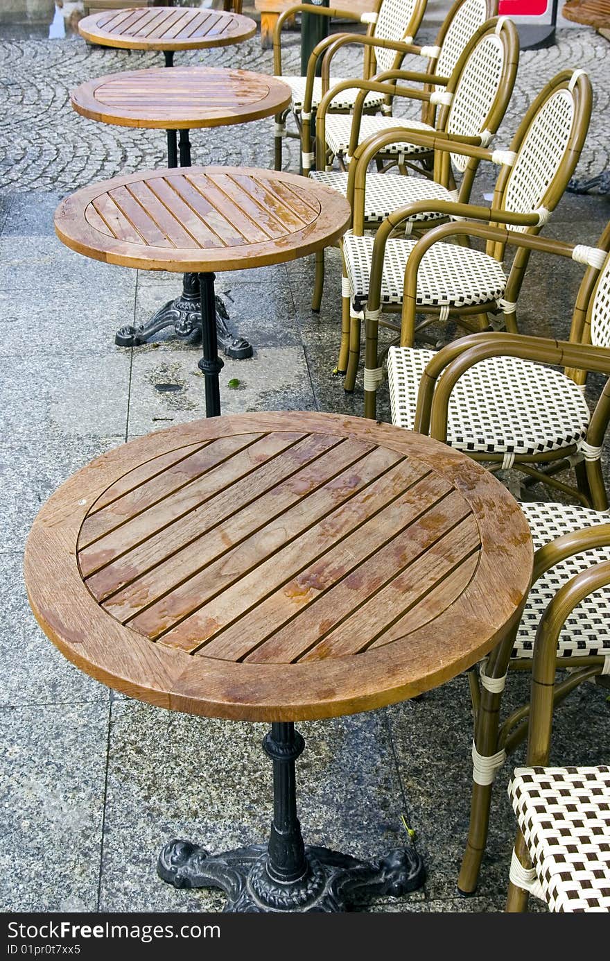 Rain And Cafe Tables