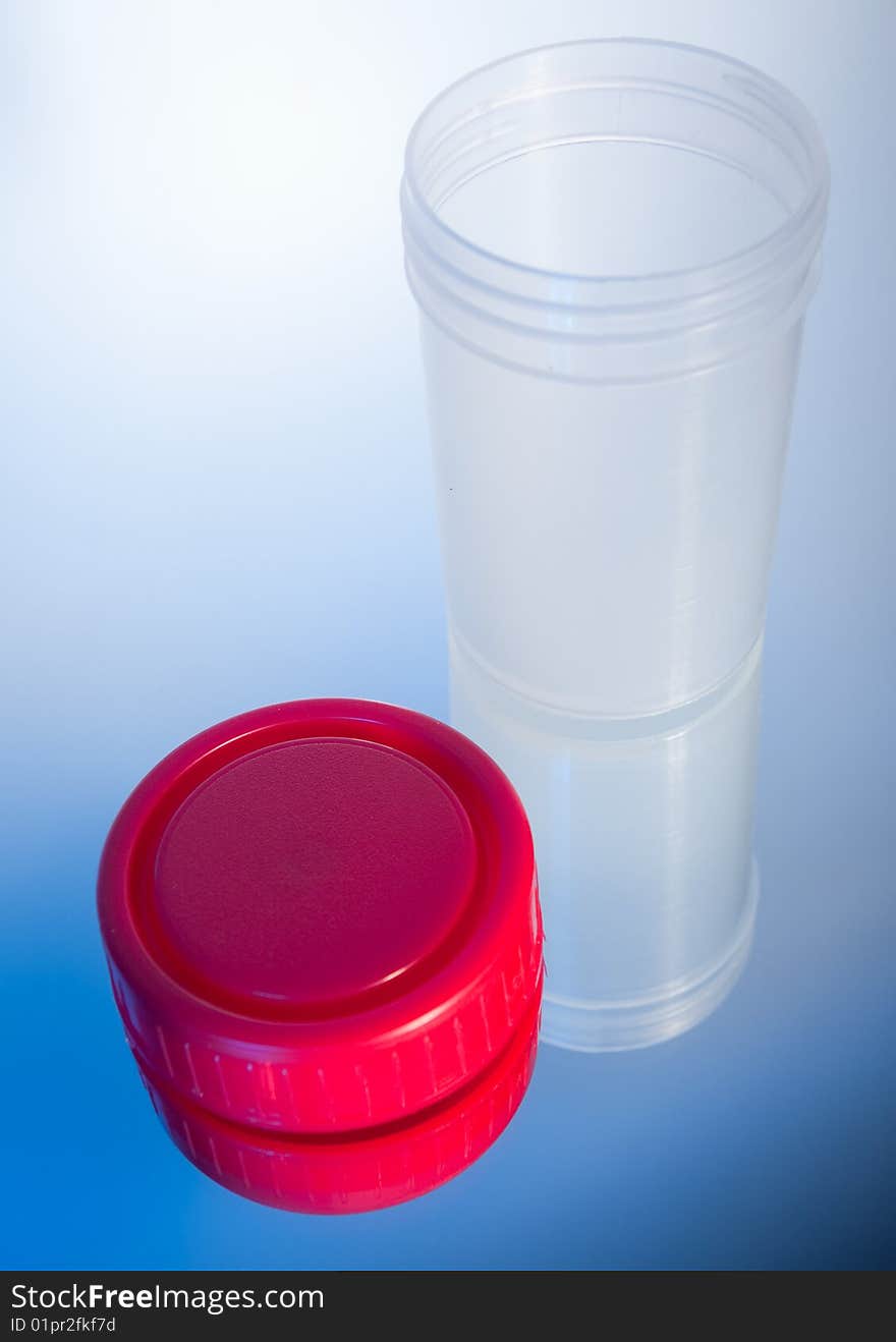 Medical container on a blue background