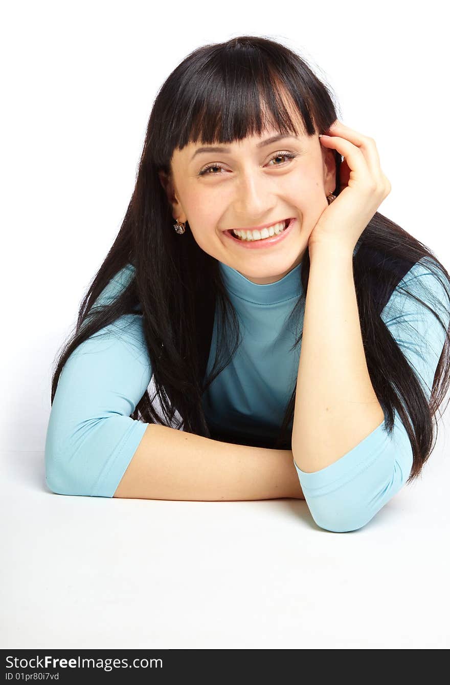 Beautiful smiling girl lying on floor