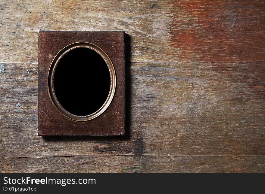 Empty Frame On Wooden Background