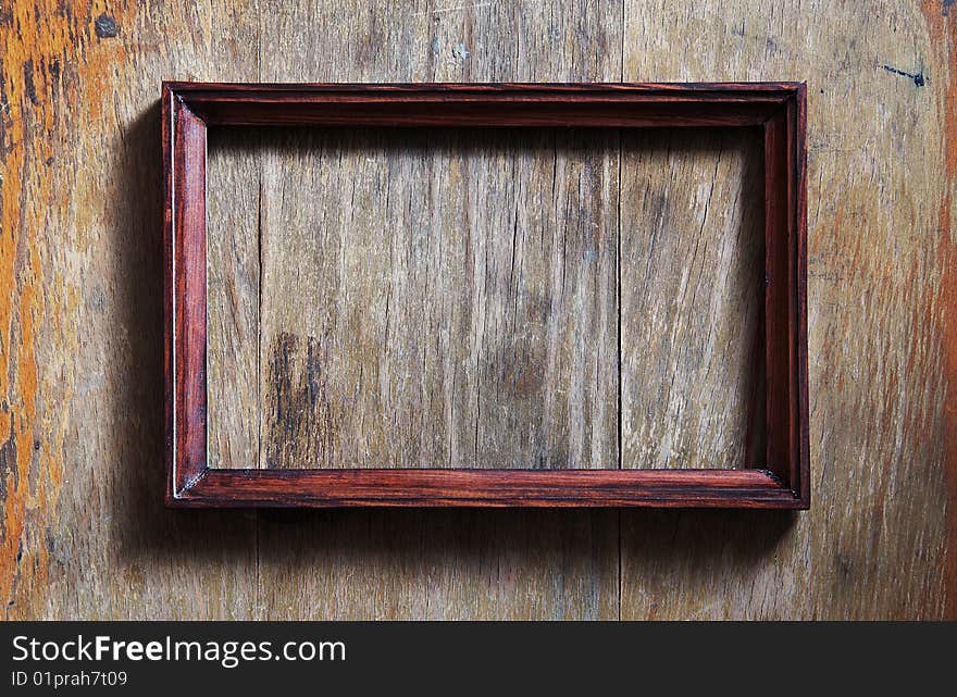 Empty Frame On Wooden Background