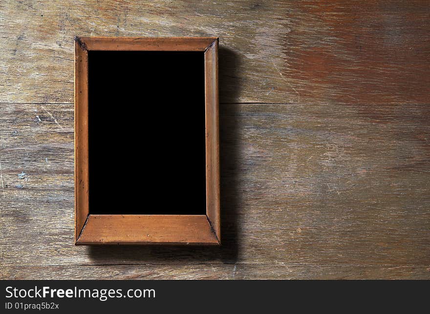 Empty Frame On Wooden Background