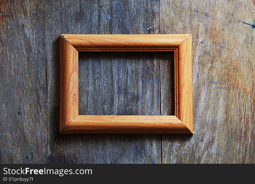 Empty Frame On Wooden Background