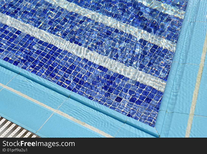 Blue water in swimming pool