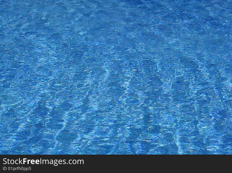 Blue water in swimming pool