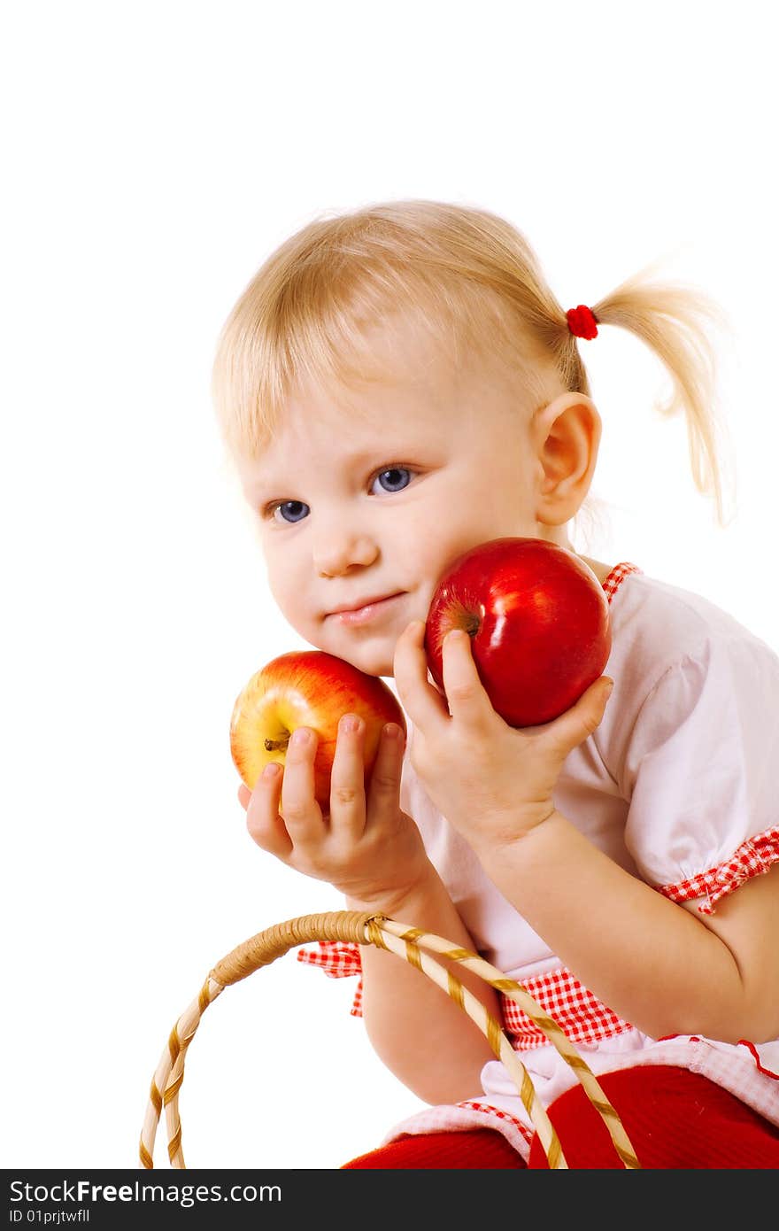 Small girl with red apples. Small girl with red apples