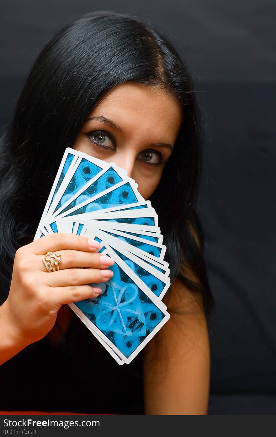 Portrait brunette girl with cards