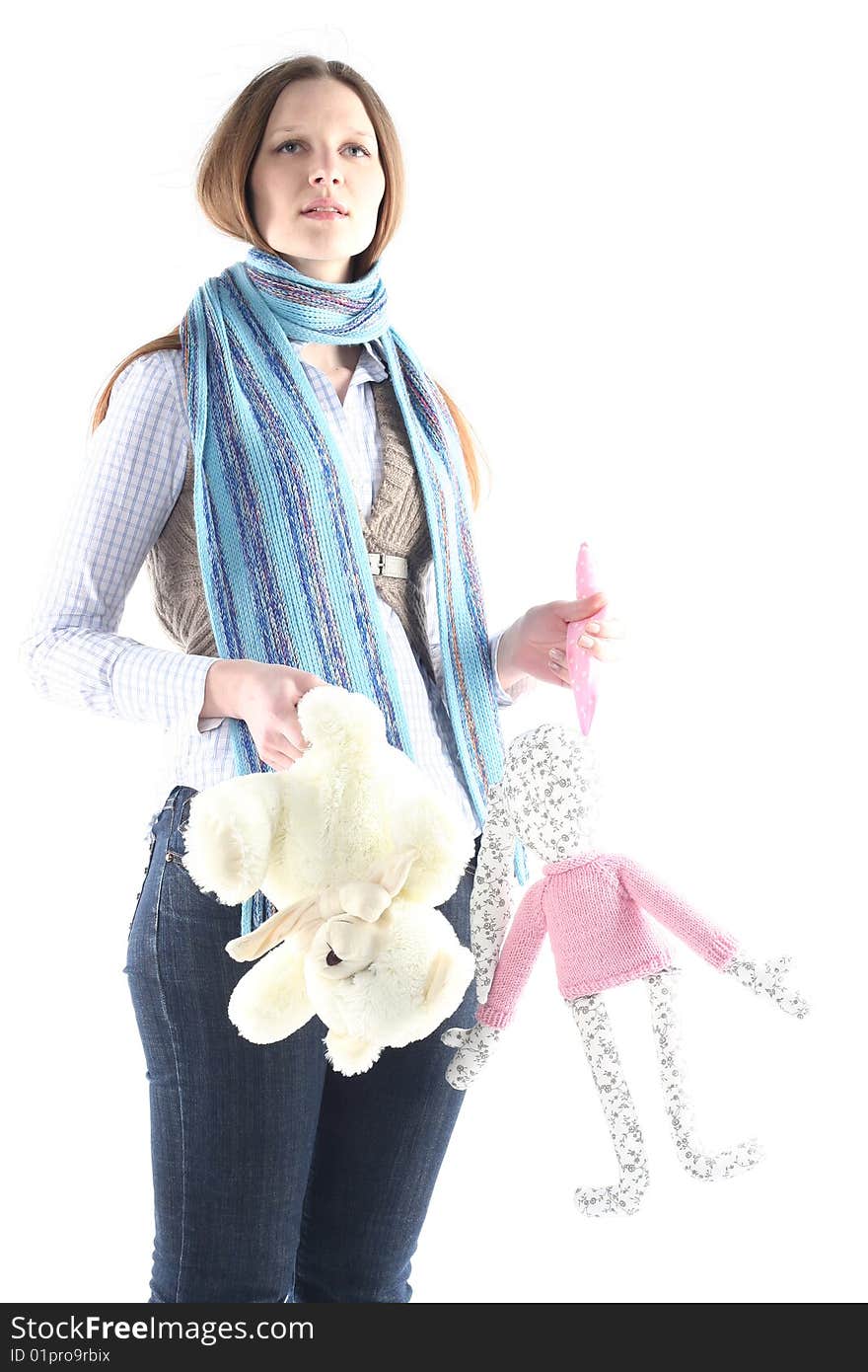 Young girl with rabbit toy and teddy bear. Young girl with rabbit toy and teddy bear