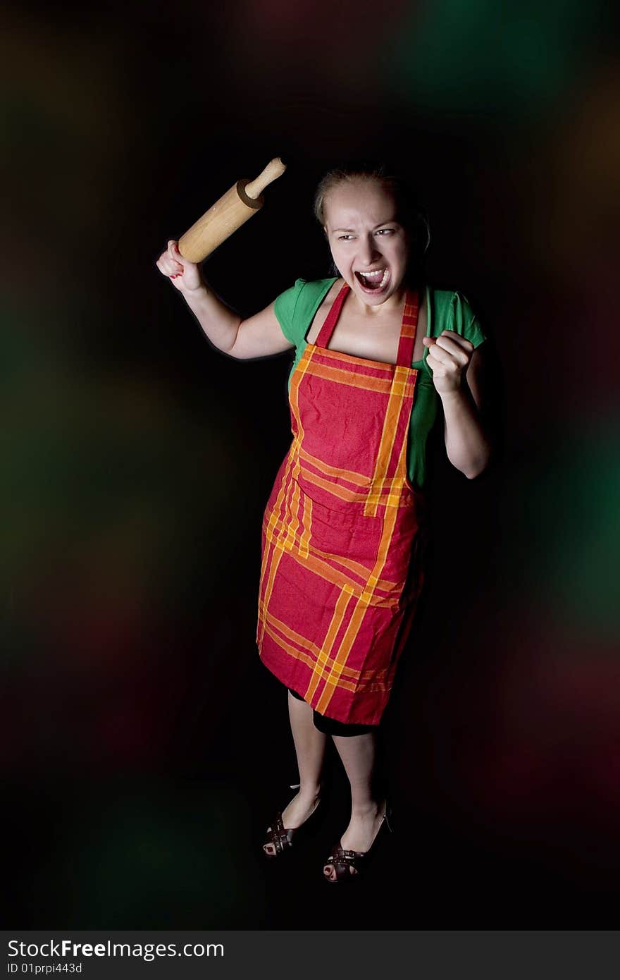 woman with kitchen tool (rolling pin). woman with kitchen tool (rolling pin)