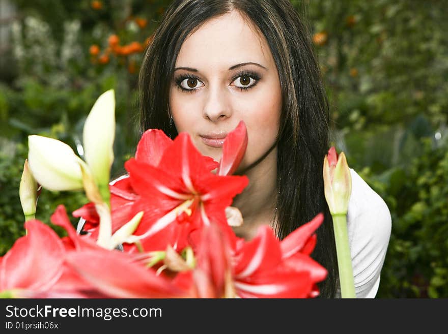 Portrait of a young girl with a flower