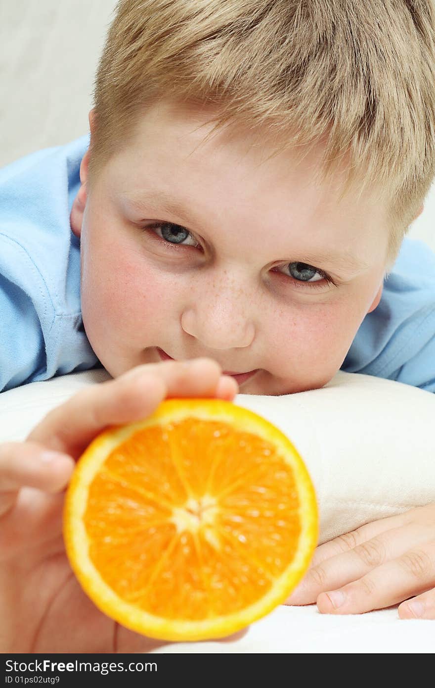 Boy with an orange