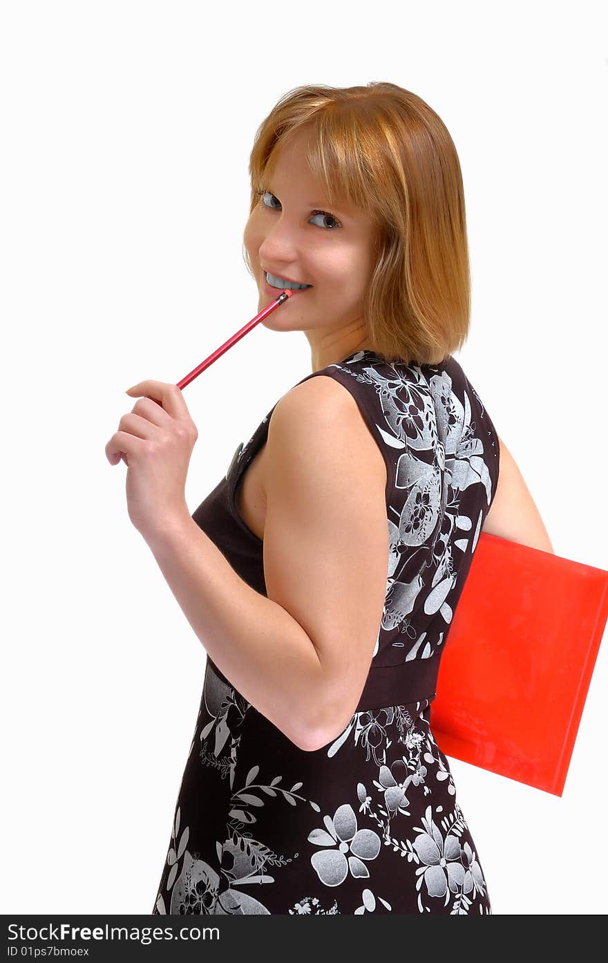 Smiling woman with a pencil in hands (on a light gray background)