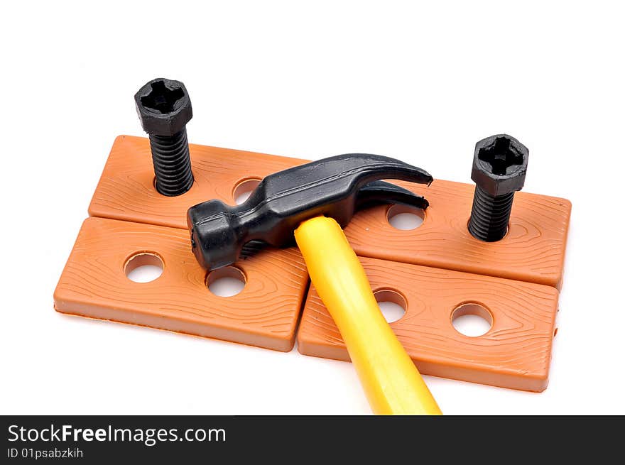 Bolts and hammer isolated on white background.