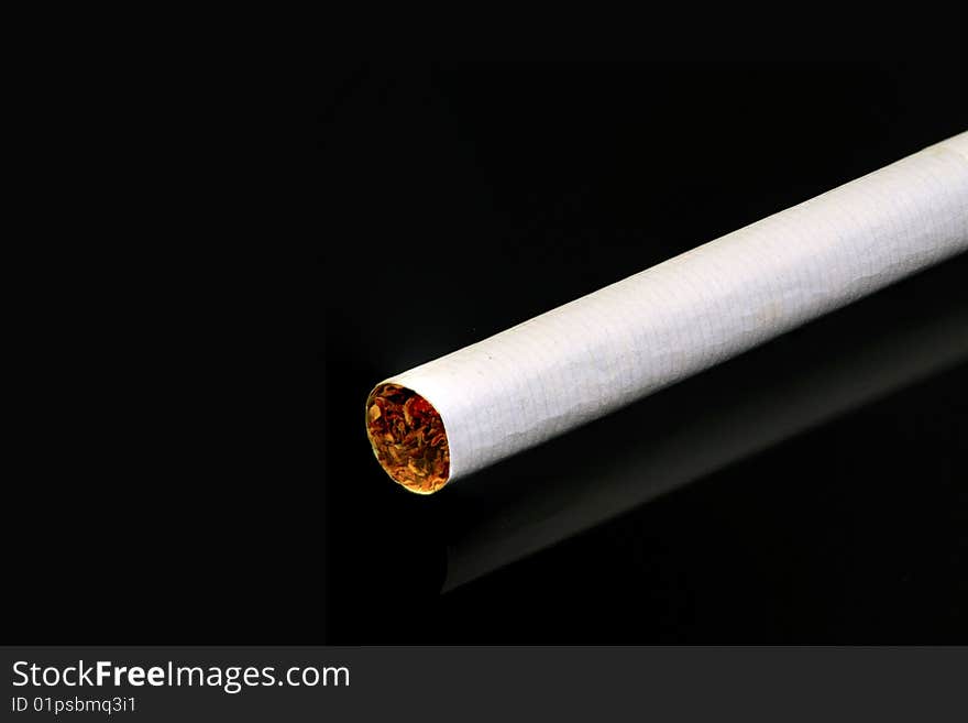 Single Cigarette On Black