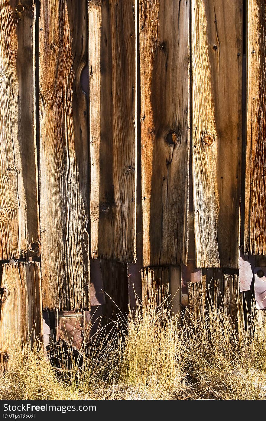 Abstract patterns in a weathered wall in a ghost town. Abstract patterns in a weathered wall in a ghost town