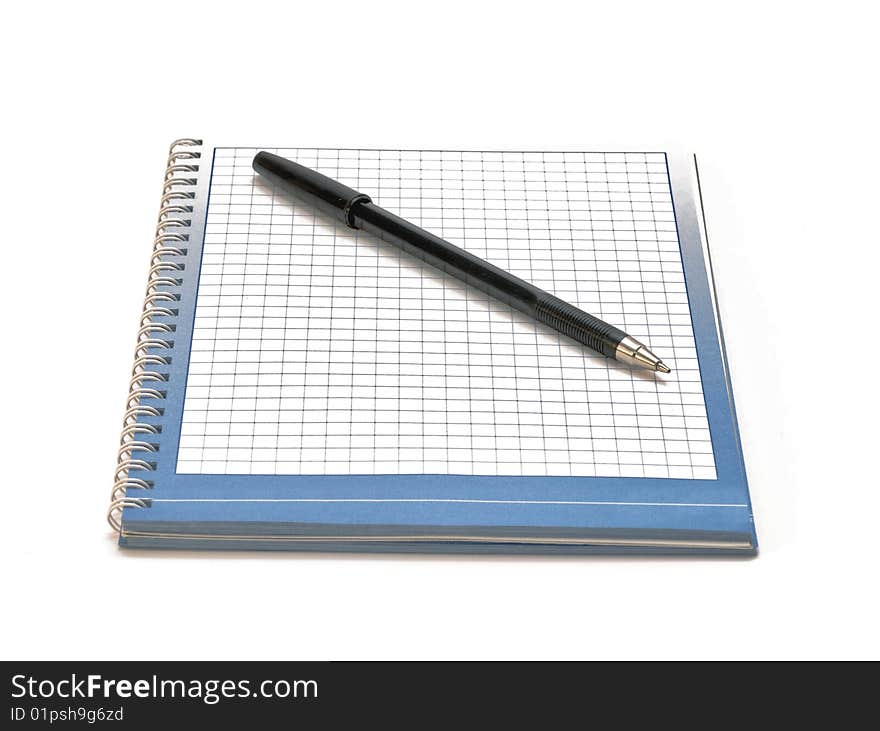 The pen and notebook on a white background