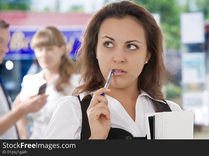 Portrait of young pretty woman in business environment. Portrait of young pretty woman in business environment