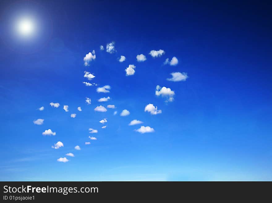 Blue sky with heart shaped clouds