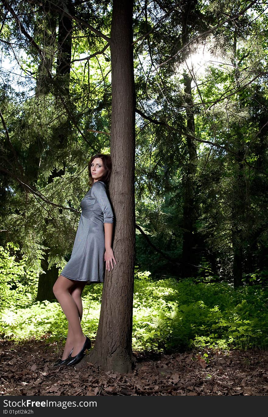 Beauty Woman In The Summer Forest