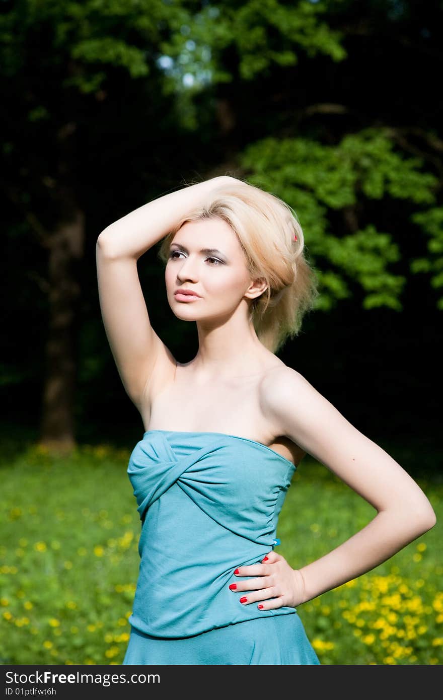 Pretty Female Portrait In The Summer Park