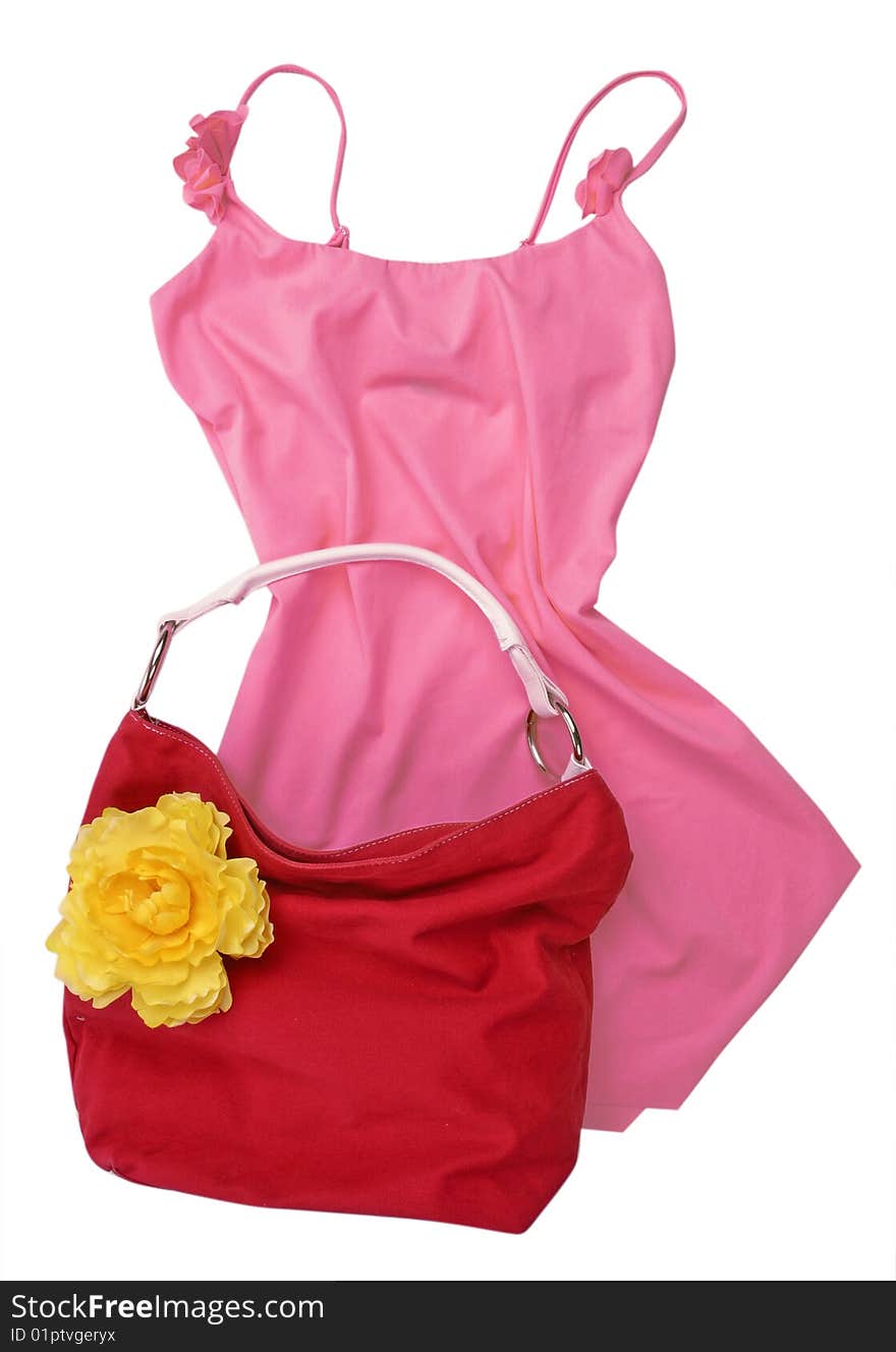 Pink silk dress and red bag