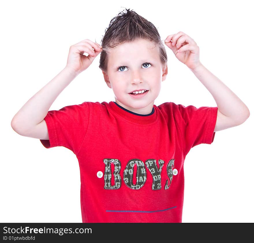 Cute blue-eyed boy posing in studio