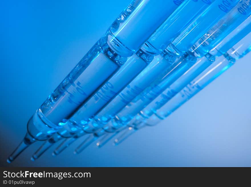 Ampoules on a blue background