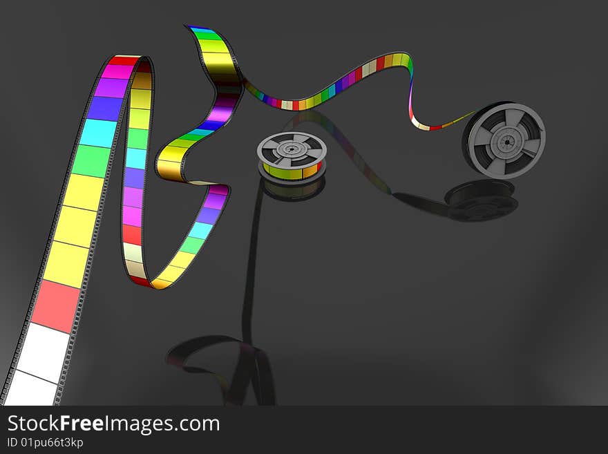 Two Film reels on black background unrolled in various bright colors. Two Film reels on black background unrolled in various bright colors