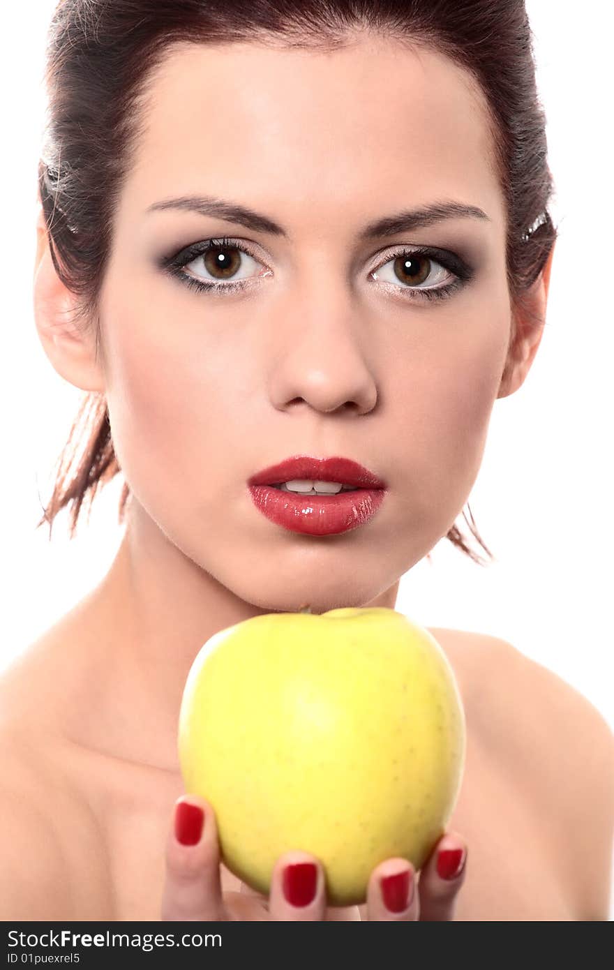 Close-up portrait of young beautiful healthy woman with yellow apple isolated on white. Close-up portrait of young beautiful healthy woman with yellow apple isolated on white