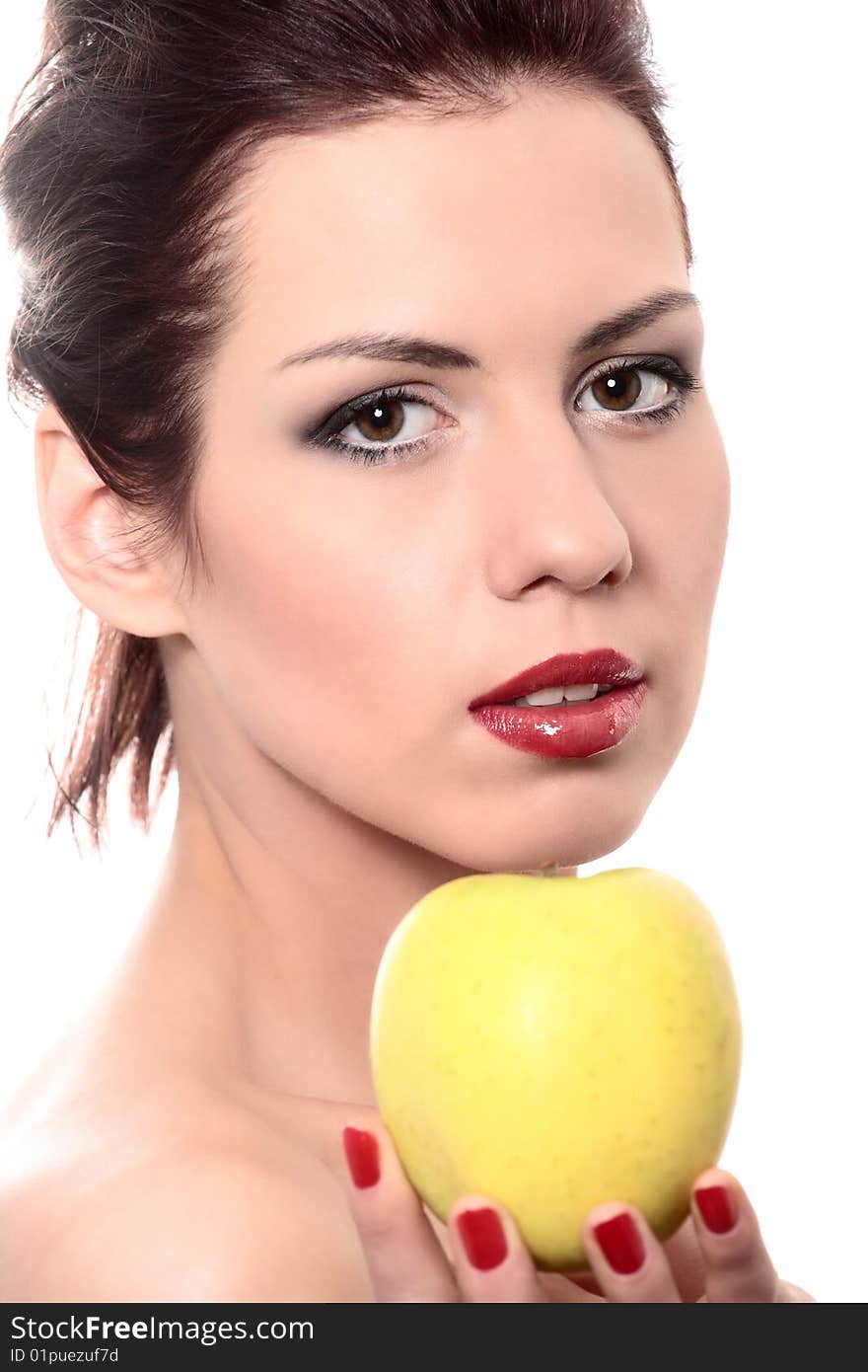 Close-up portrait of young beautiful healthy woman with yellow apple isolated on white. Close-up portrait of young beautiful healthy woman with yellow apple isolated on white