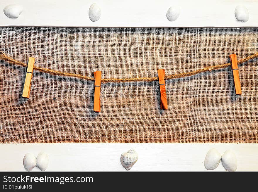 Old message board with wooden laundry clips. Old message board with wooden laundry clips