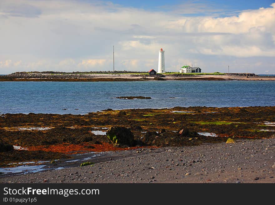 Beach And Lighthouse