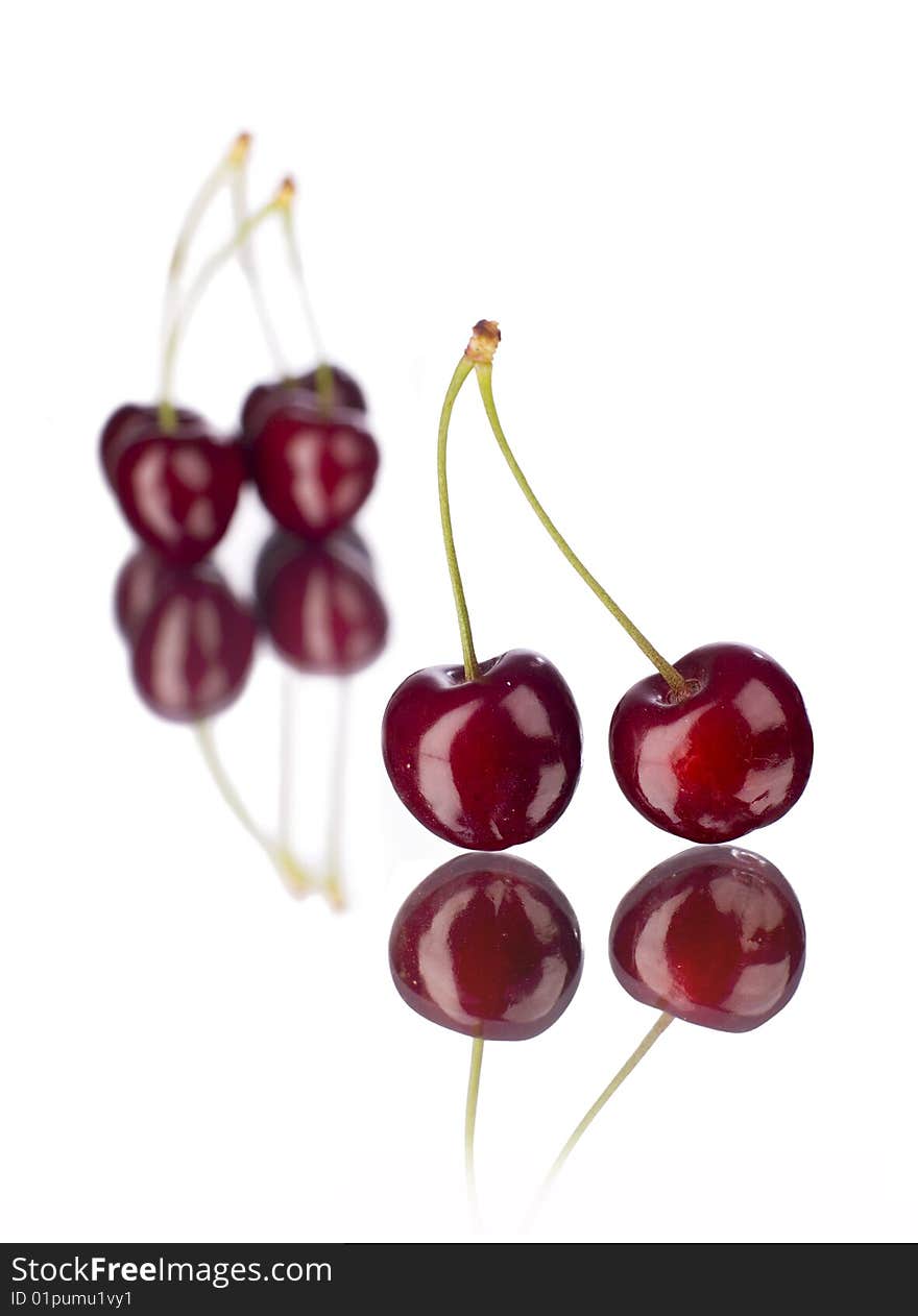 Pairs of fresh cherry with white background. Pairs of fresh cherry with white background