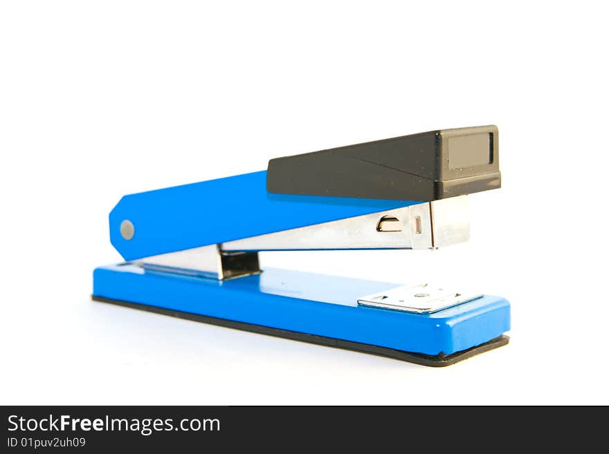 Single blue,chrome and black stapler on a white background. Single blue,chrome and black stapler on a white background