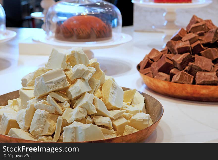 A display of an enormous pile of white chocolate