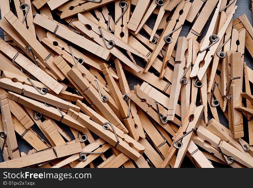 A closeup of a unorganized group of clothes pegs. A closeup of a unorganized group of clothes pegs