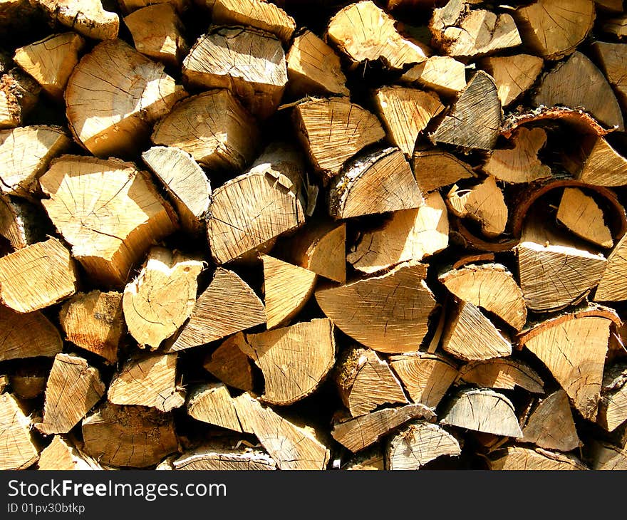 A Pile of freshly split pieces of firewood. A Pile of freshly split pieces of firewood.