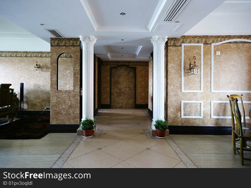 Hallway in new modern home with pillars. Hallway in new modern home with pillars.