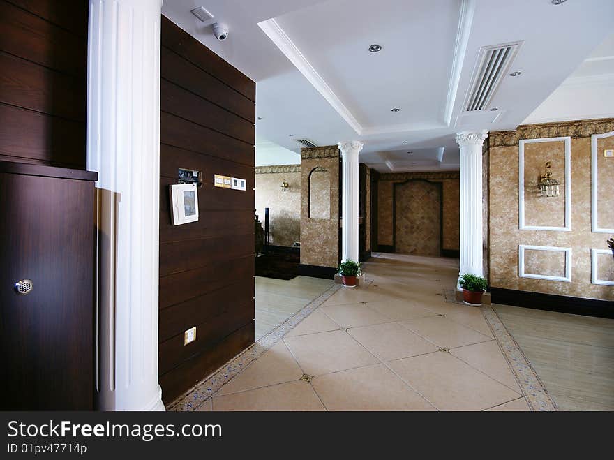 Hallway in new modern home with pillars. Hallway in new modern home with pillars.