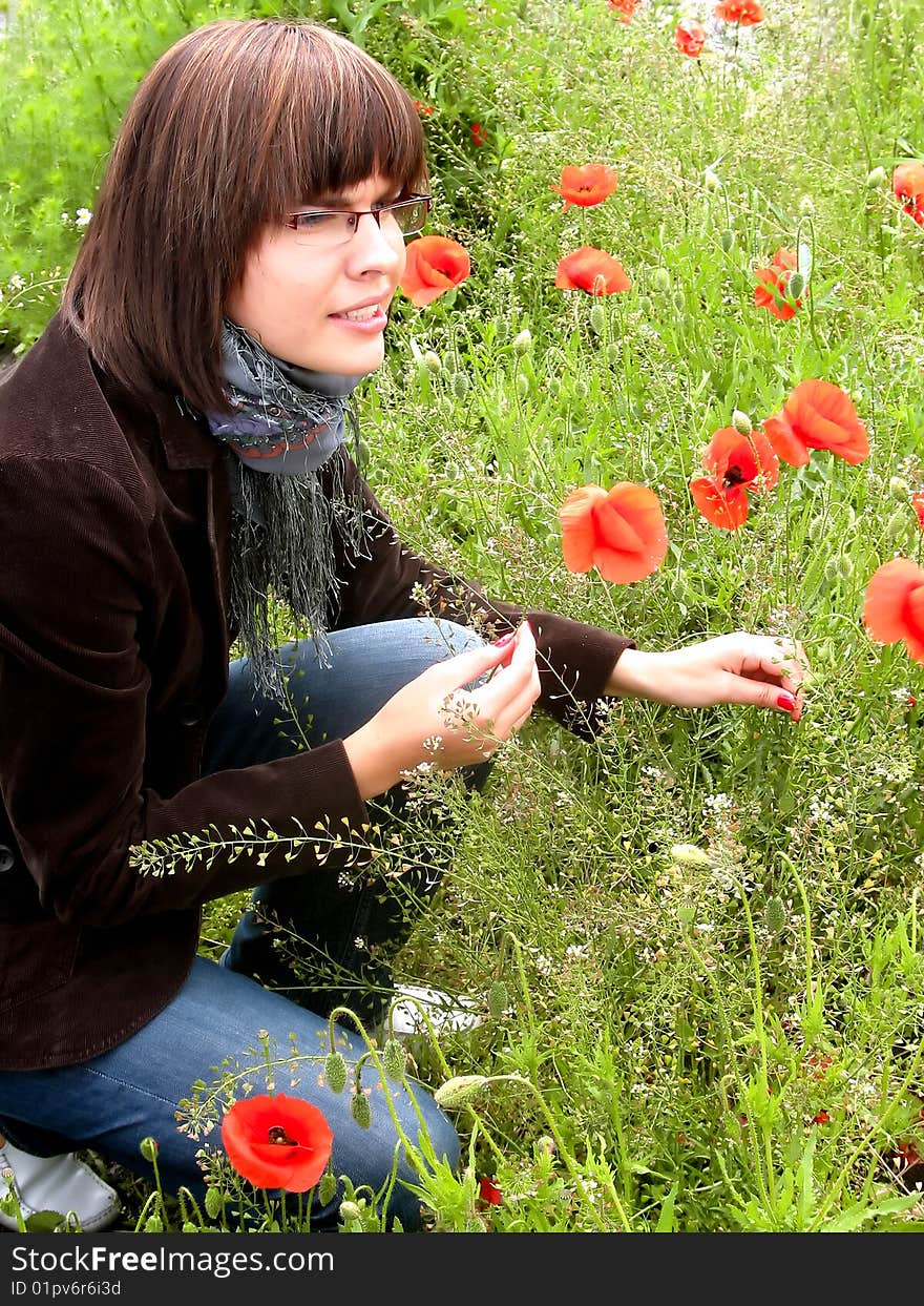 Girl among flowers