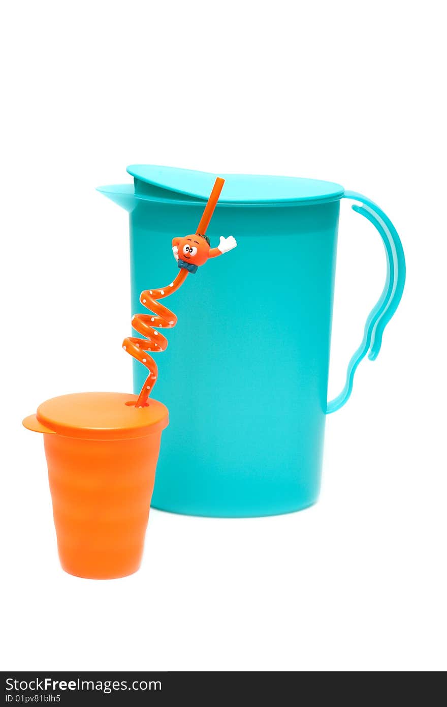 Plastic pitcher and glass on white background