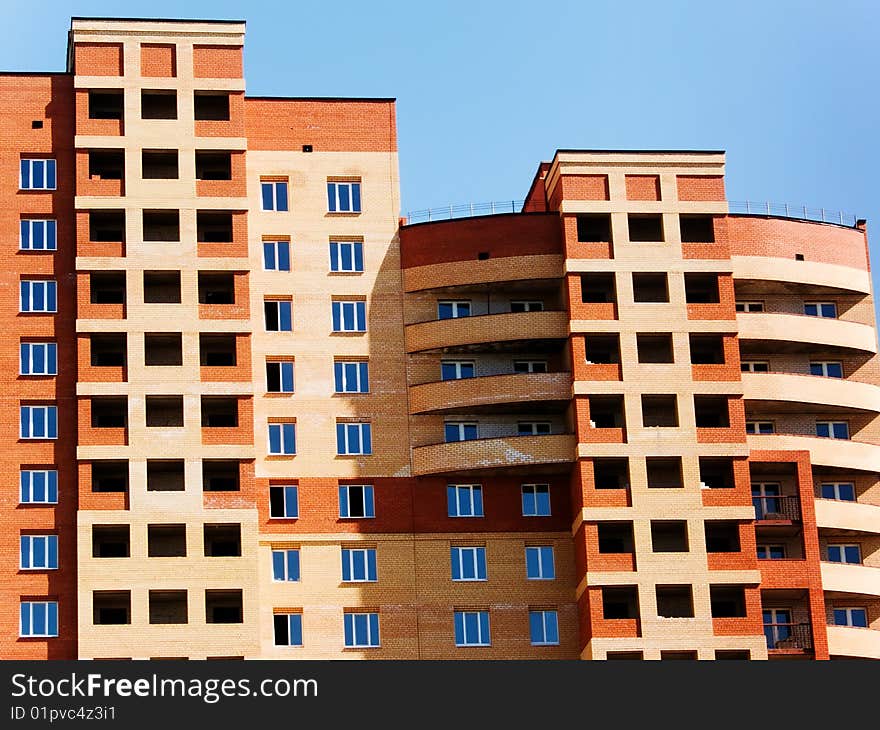 Windows of the house from a brick