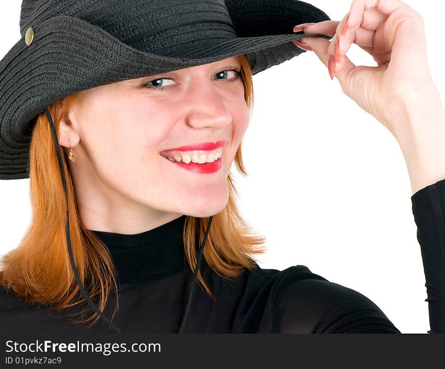 Sexy red young woman wearing a cowboy hat