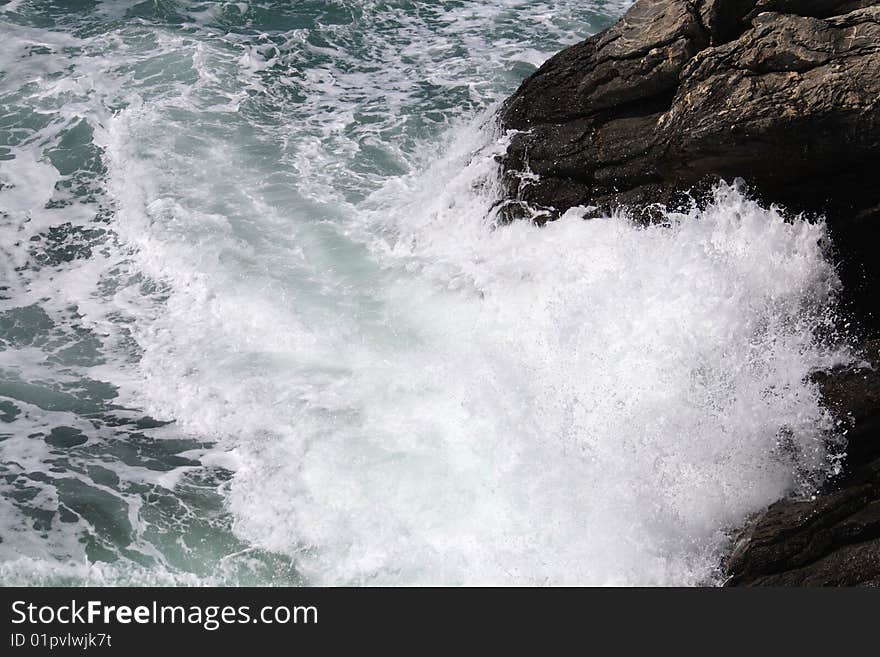 Mediterrean sea while hits rocks. Mediterrean sea while hits rocks