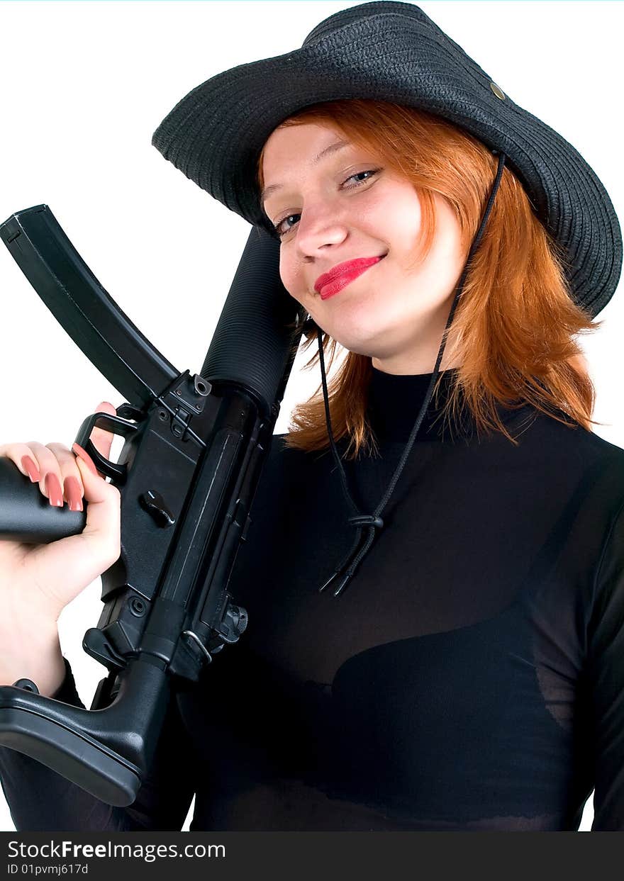 red young woman in a cowboy hat holding the gun