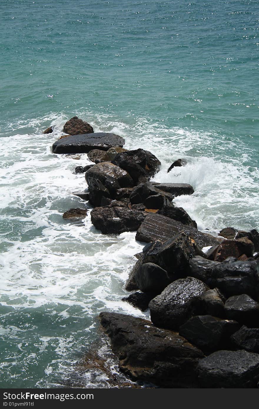 Mediterrean sea while hits rocks. Mediterrean sea while hits rocks