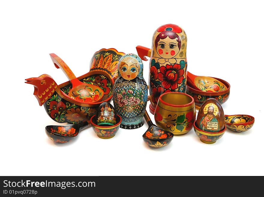 Assorted Russian folk wooden toys and utensils isolated. Assorted Russian folk wooden toys and utensils isolated