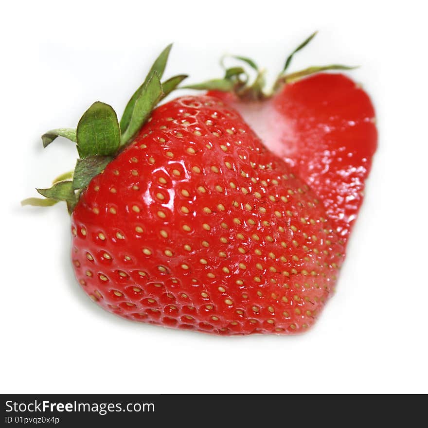 Close-up of strawberries on white background. Close-up of strawberries on white background.